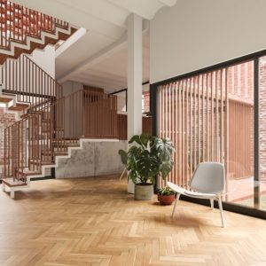 Ampio e luminoso ingresso open space con parquet, grandi finestre e scale che conducono al piano superiore